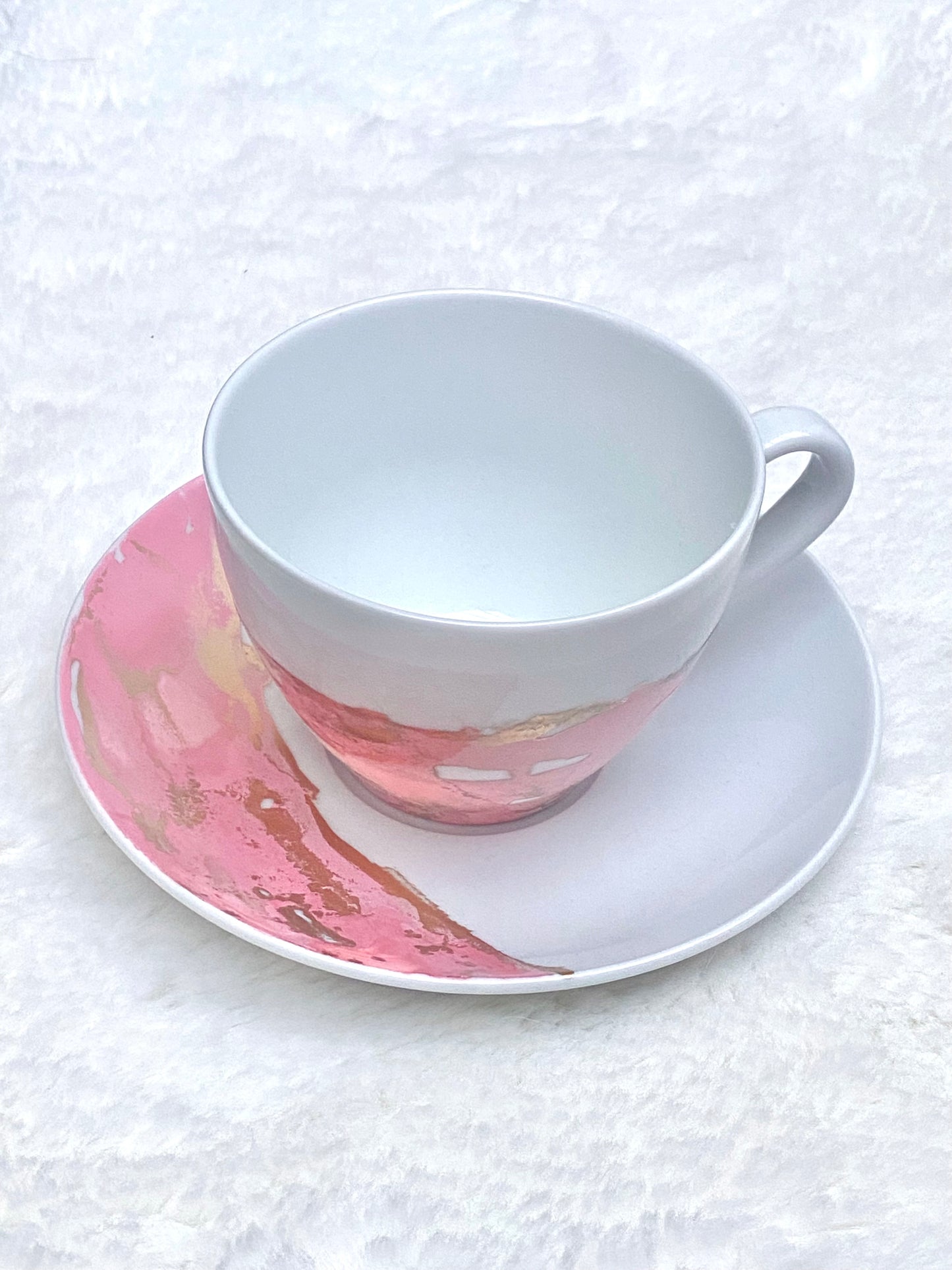 Hand-Painted White Porcelain Teacup and Saucer